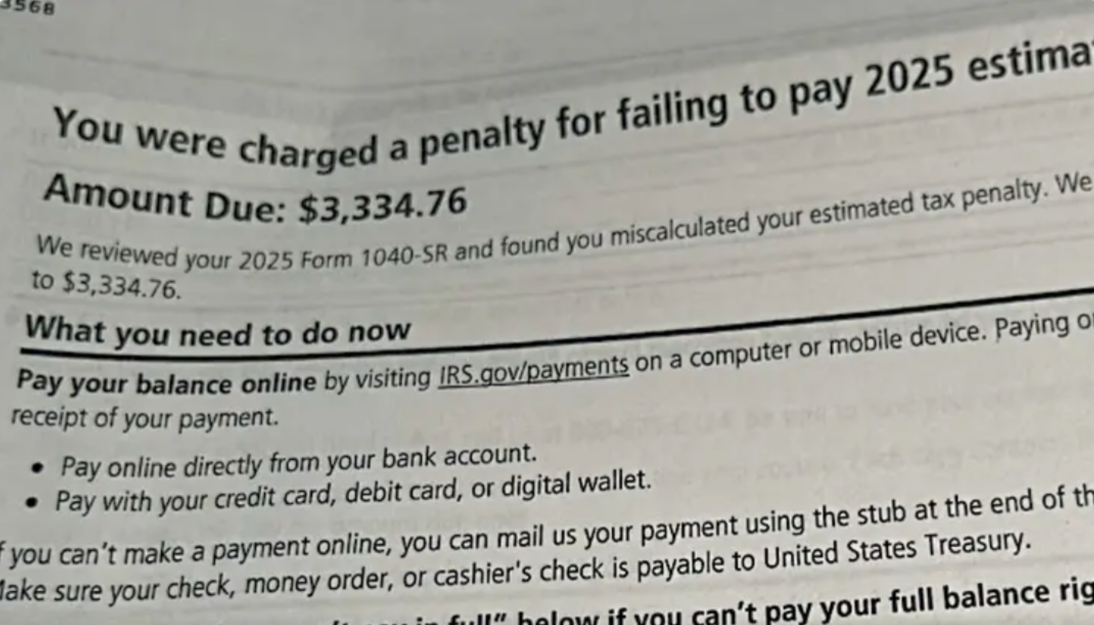 IRS penalty notice showing Amount Due: $3,334.76